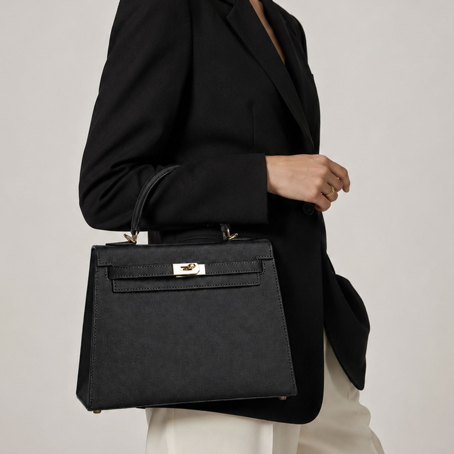 Noir Lock Structured Top Handle Bag