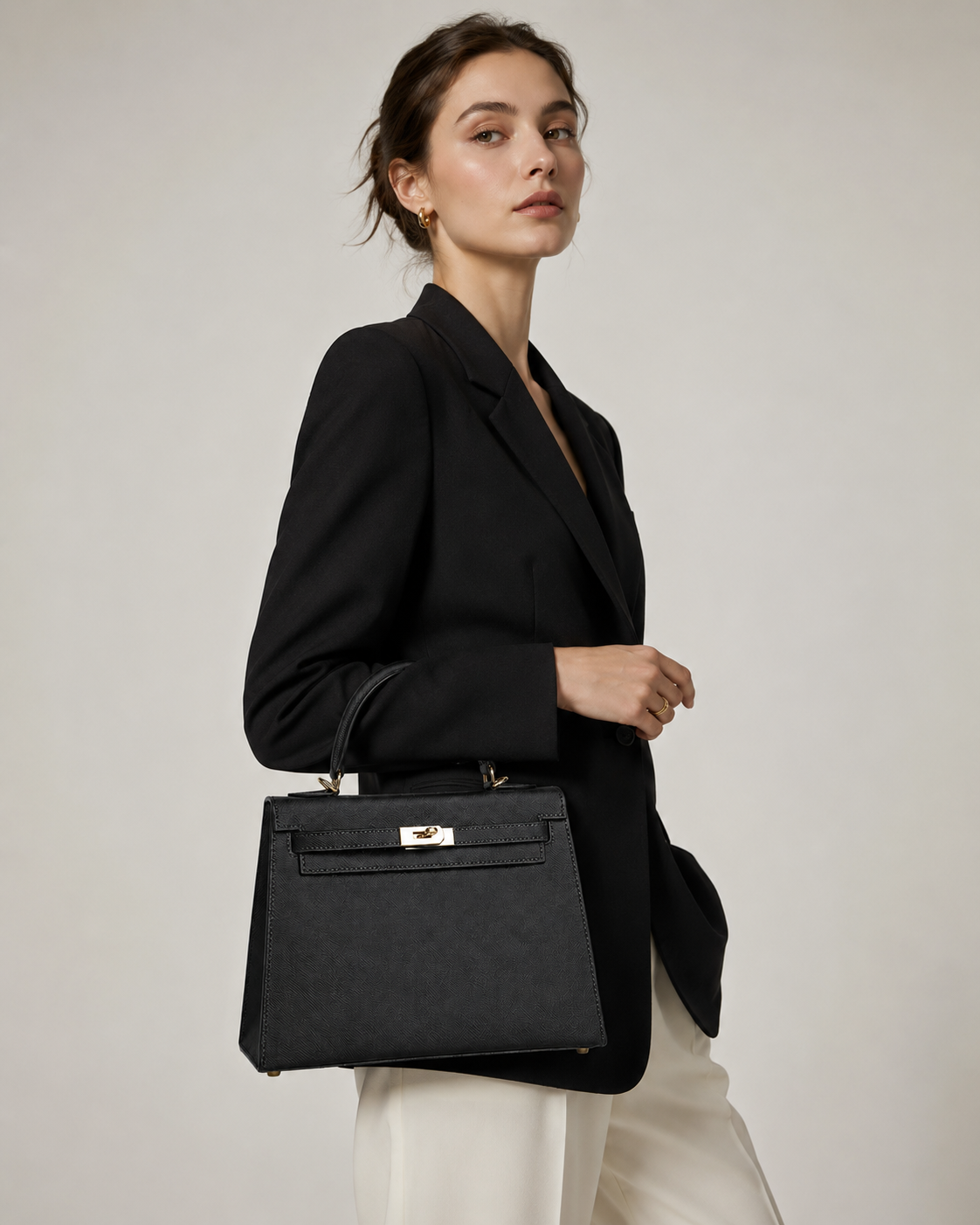 Noir Lock Structured Top Handle Bag outfit scenario