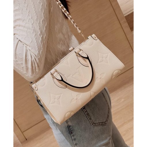 Louis Vuitton Grained Cowhide Leather OnTheGo East West Bag M23698 M23640 White - Image 5